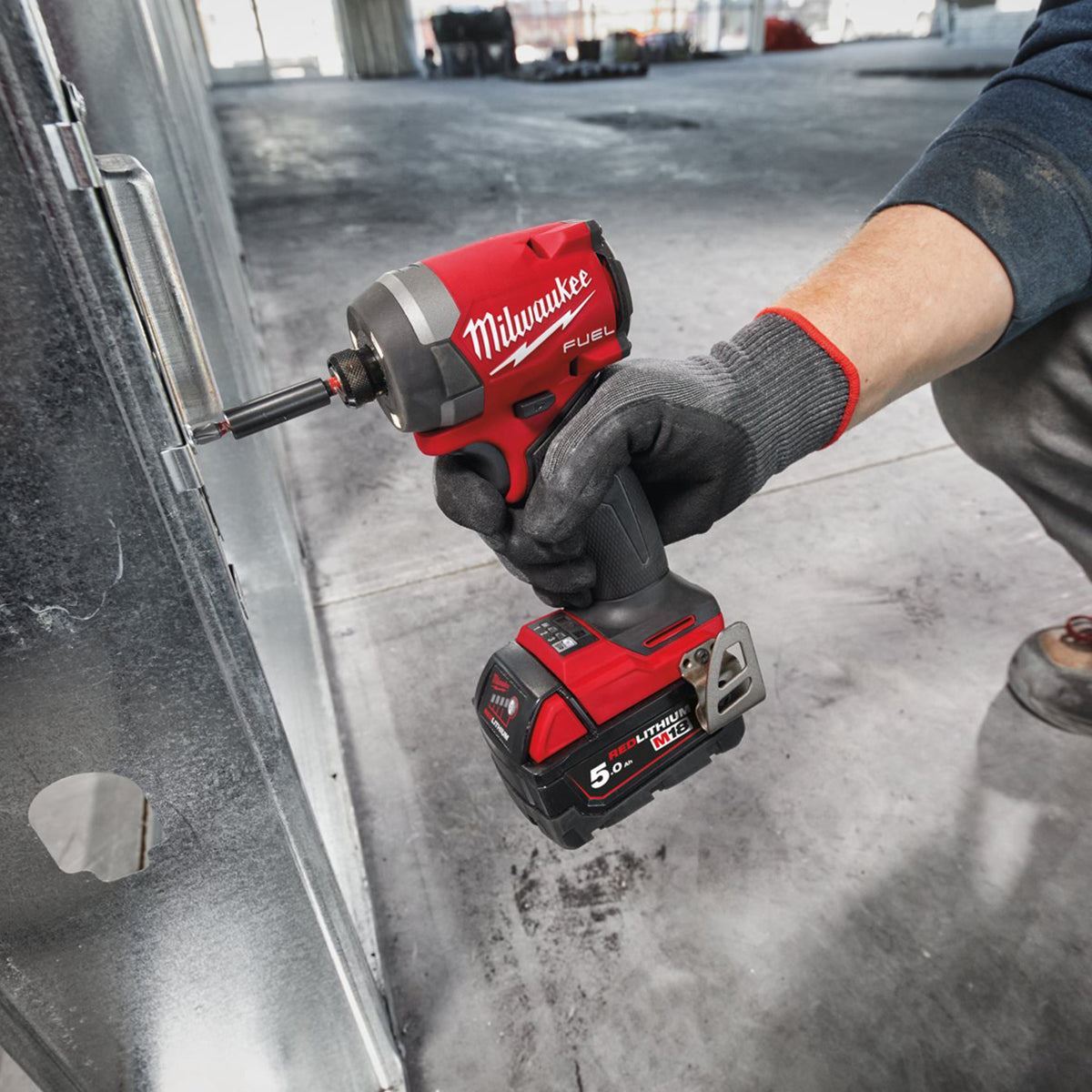 Milwaukee M18FID3100P-502P 18V FUEL Brushless 1/4" Impact Driver with 2 x 5.0Ah Batteries, Charger, Packout Case & Accessories Set 4933499037
